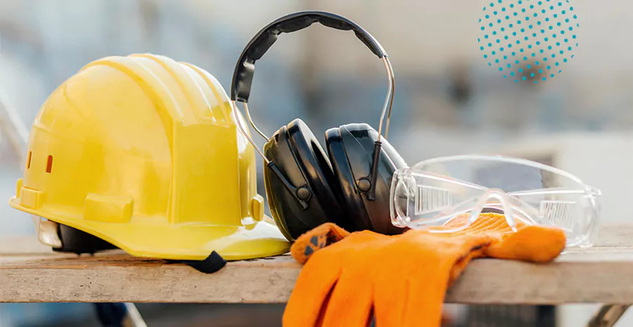 imagem de equipamentos de proteção de um capacete, fones e luvas