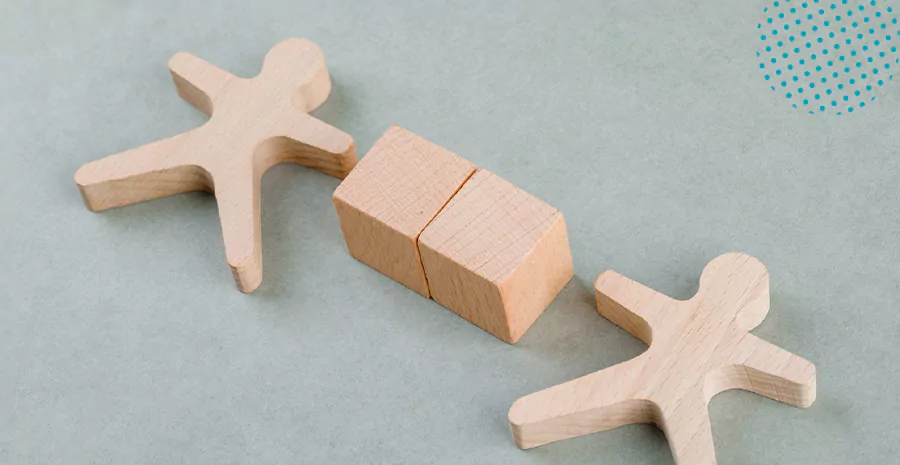 imagem de blocos de madeira em formato de pessoas e quadrados