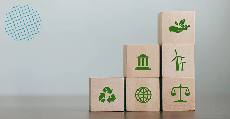 Blocos com ícones referentes à sustentabilidade empilhados como uma escada