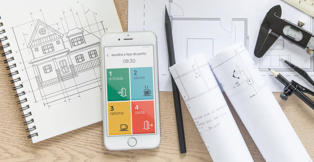 imagem mostra papéis com projetos de casa e um celular aberto no aplicativo de ponto da Pontotel